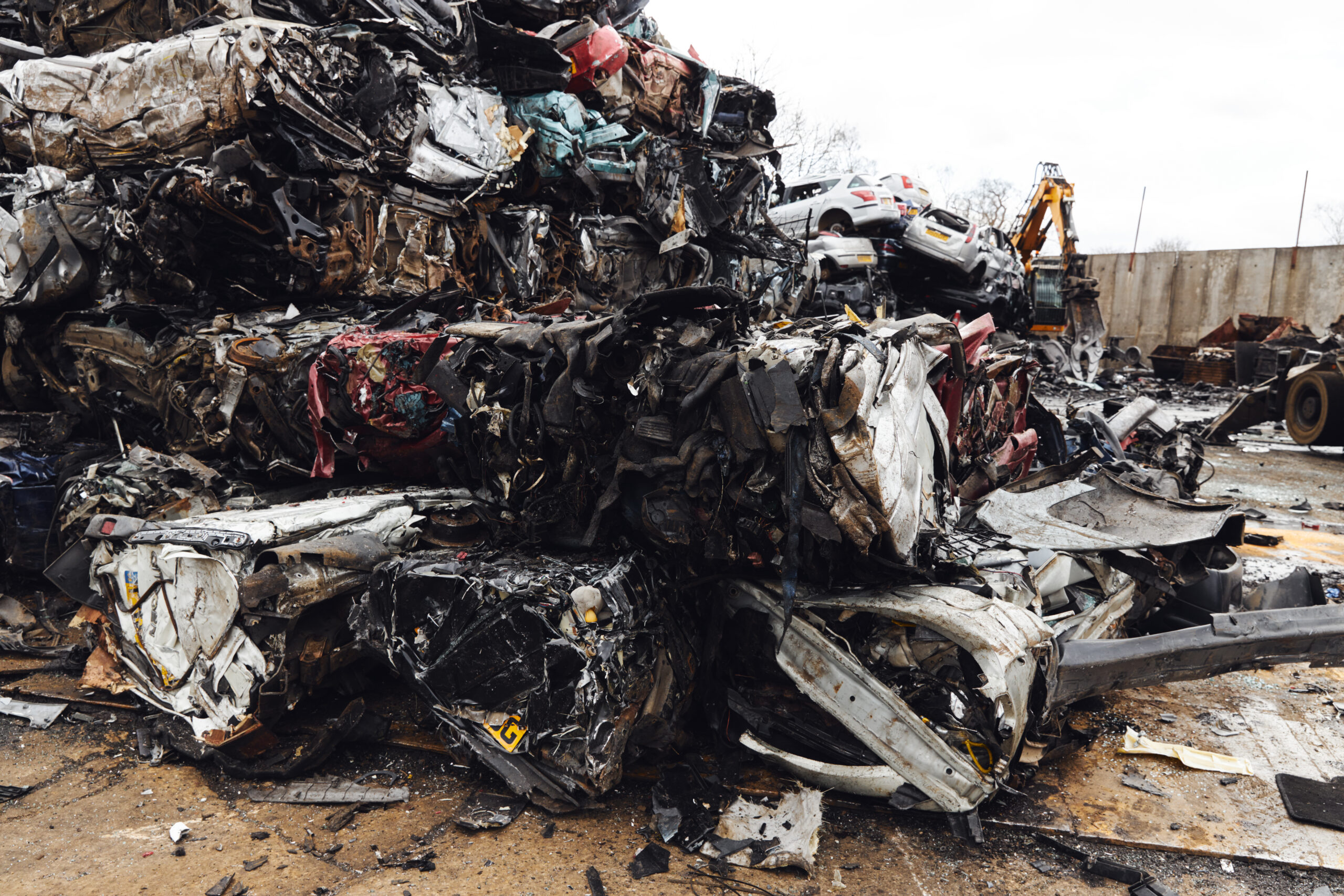 Scrapped cars crushed in vehicle recycling centre